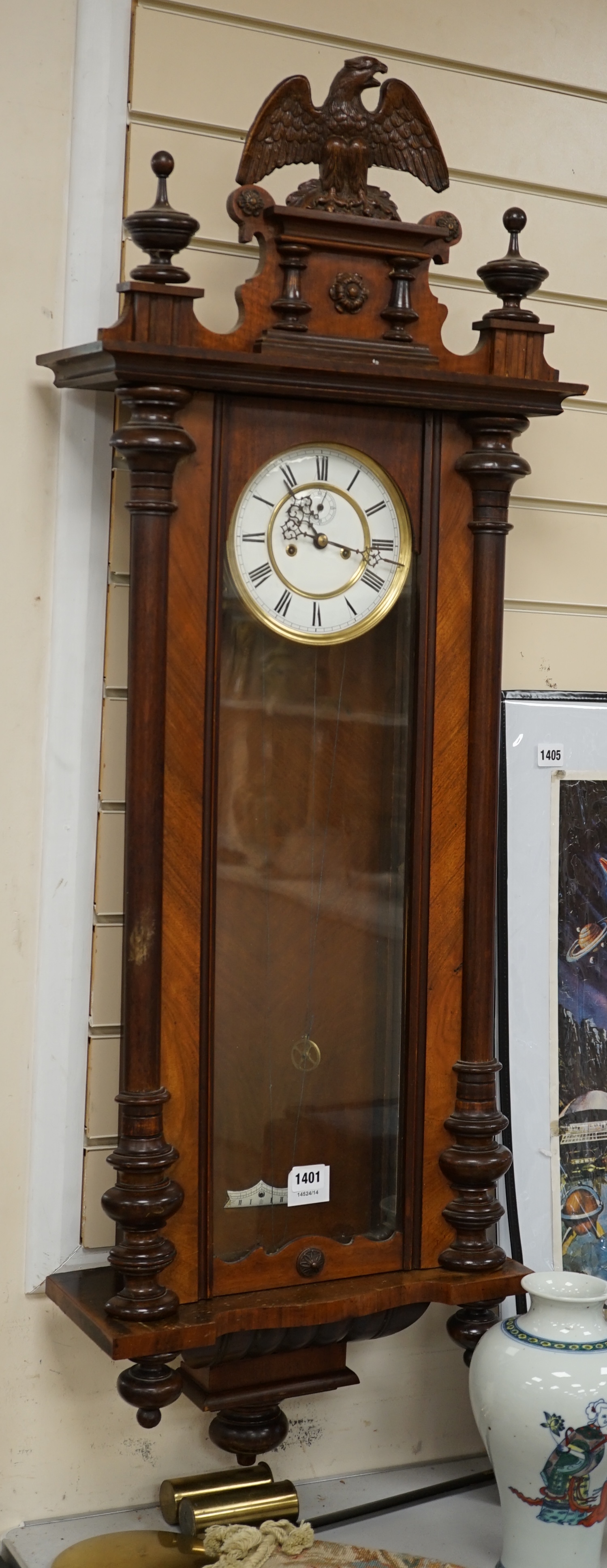 A mahogany Vienna regulator wall clock, approximately 120cm high. Condition - unknown if in working condition, dial good, case has minor scratches